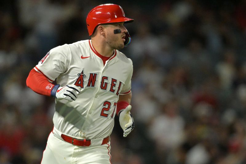 Sep 23, 2025; Anaheim, California, USA;  Los Angeles Angels designated hitter Mike Trout (27) runs to first on a fly out in the fourth inning against the Kansas City Royals at Angel Stadium. Mandatory Credit: Jayne Kamin-Oncea-Imagn Images