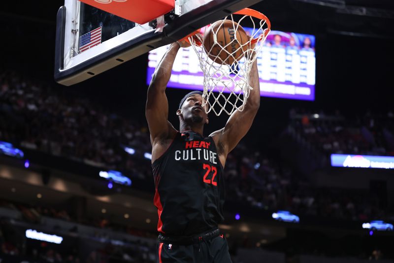 MIAMI, FLORIDA - MARCH 05: Jimmy Butler #22 of the Miami Heat dunks the ball against the Detroit Pistons during the second quarter of the game at Kaseya Center on March 05, 2024 in Miami, Florida. NOTE TO USER: User expressly acknowledges and agrees that, by downloading and or using this photograph, User is consenting to the terms and conditions of the Getty Images License Agreement. (Photo by Megan Briggs/Getty Images)