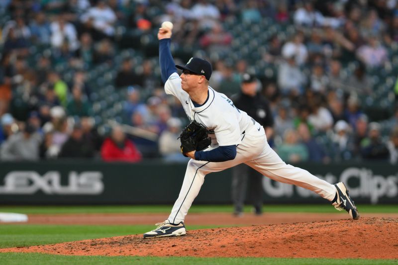 May 14, 2024; Seattle, Washington, USA; Seattle Mariners relief pitcher Trent Thornton (46) pitches to the Kansas City Royals during the seventh inning at T-Mobile Park. Mandatory Credit: Steven Bisig-USA TODAY Sports