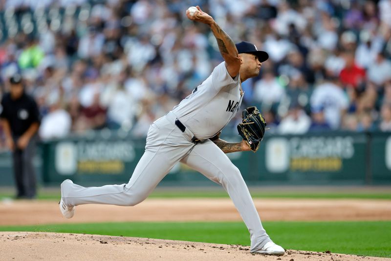 Aug 12, 2024; Chicago, Illinois, USA; New York Yankees pitcher Luis Gil (81) throws pitch against the Chicago White Sox during the first inning at Guaranteed Rate Field. Mandatory Credit: Kamil Krzaczynski-USA TODAY Sports