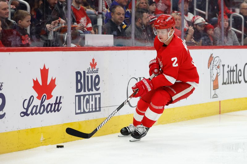 Feb 24, 2024; Detroit, Michigan, USA;  Detroit Red Wings defenseman Olli Maatta (2) skates with the puck in the first period against the St. Louis Blues at Little Caesars Arena. Mandatory Credit: Rick Osentoski-USA TODAY Sports