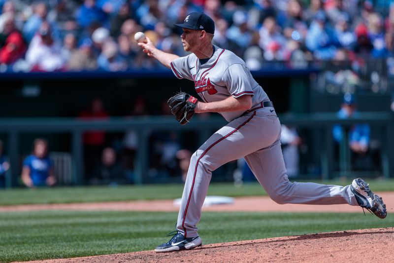 Apr 16, 2023; Kansas City, Missouri, USA; Atlanta Braves relief pitcher Michael Tonkin (51) pitches during the sixth inning against the Kansas City Royals at Kauffman Stadium. Mandatory Credit: William Purnell-USA TODAY Sports