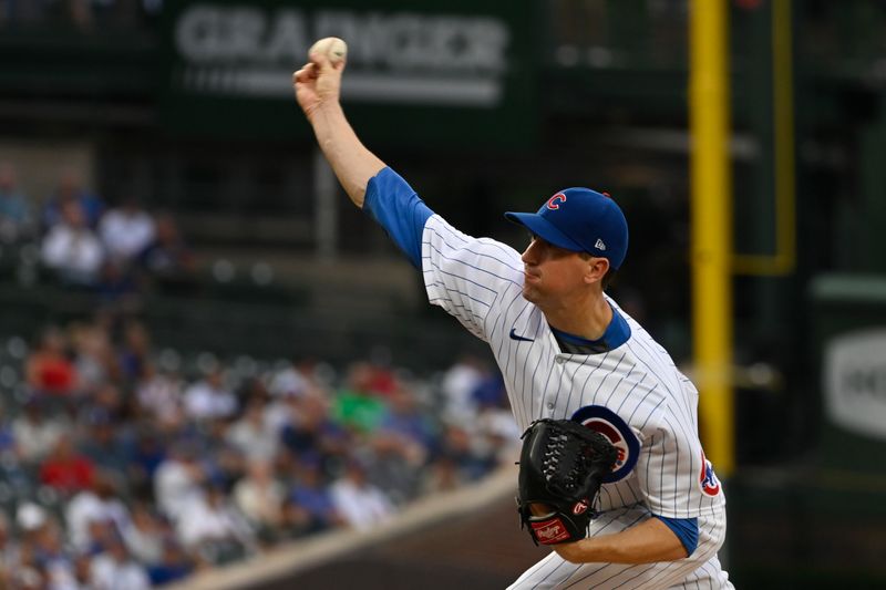 Jul 19, 2023; Chicago, Illinois, USA;  Chicago Cubs starting pitcher Kyle Hendricks (28) delivers against the Washington Nationals during the first inning at Wrigley Field. Mandatory Credit: Matt Marton-USA TODAY Sports