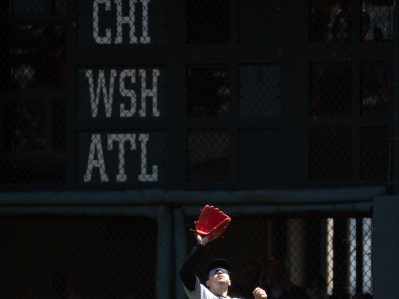 May 14, 2025; San Francisco, California, USA; Arizona Diamondbacks right fielder Corbin Carroll (7) makes the catch of a sacrifice fly by San Francisco Giants left fielder Heliot Ramos during the second inning at Oracle Park. Mandatory Credit: D. Ross Cameron-Imagn Images