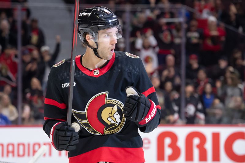 Feb 22, 2024; Ottawa, Ontario, CAN; Ottawa Senators center Josh Norris (9) celebrates his goal scored in the first period against the Dallas Stars at the Canadian Tire Centre. Mandatory Credit: Marc DesRosiers-USA TODAY Sports