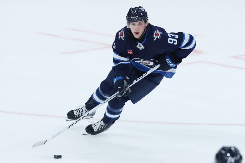 Sep 21, 2025; Winnipeg, Manitoba, CAN; Winnipeg Jets center Brad Lambert (93) skates up the ice during the third period against the Minnesota Wild at Canada Life Centre. Mandatory Credit: James Carey Lauder-Imagn Images