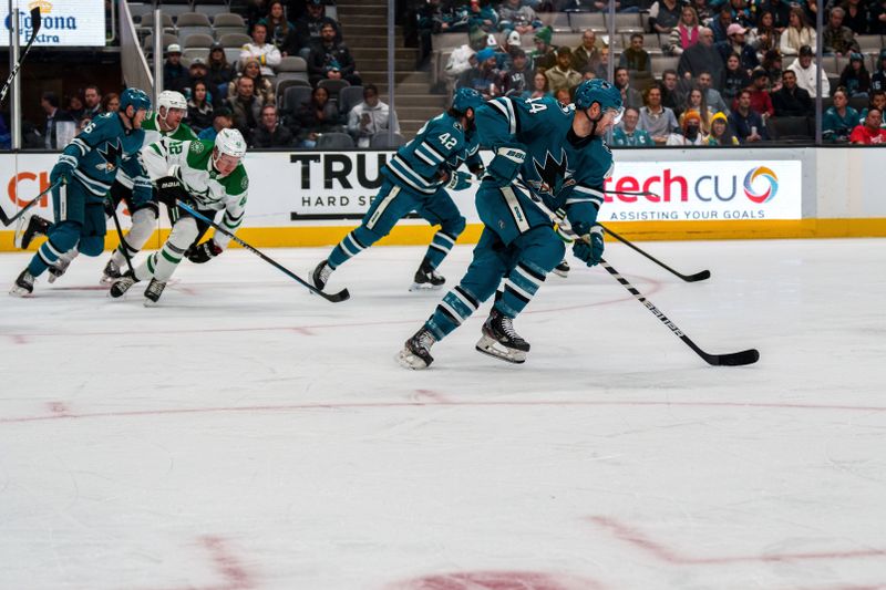 Jan 18, 2023; San Jose, California, USA; San Jose Sharks defenseman Marc-Edouard Vlasic (44) starts a fast break during the first period against the Dallas Stars at SAP Center at San Jose. Mandatory Credit: Neville E. Guard-USA TODAY Sports