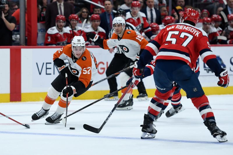 Feb 25, 2026; Washington, District of Columbia, USA; Philadelphia Flyers center Denver Barkey (52) controls the puck defended by Washington Capitals defenseman Trevor van Riemsdyk (57) during the second period at Capital One Arena. Mandatory Credit: Hannah Foslien-Imagn Images