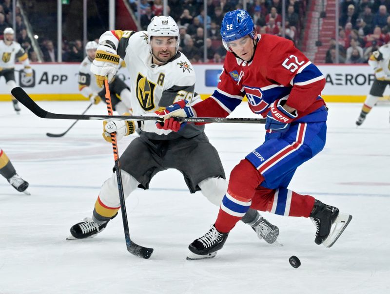 Nov 16, 2023; Montreal, Quebec, CAN; Vegas Golden Knights forward William Carrier (28) and Montreal Canadiens defenseman Justin Barron (52) battle for the puck during the third period at the Bell Centre. Mandatory Credit: Eric Bolte-USA TODAY Sports