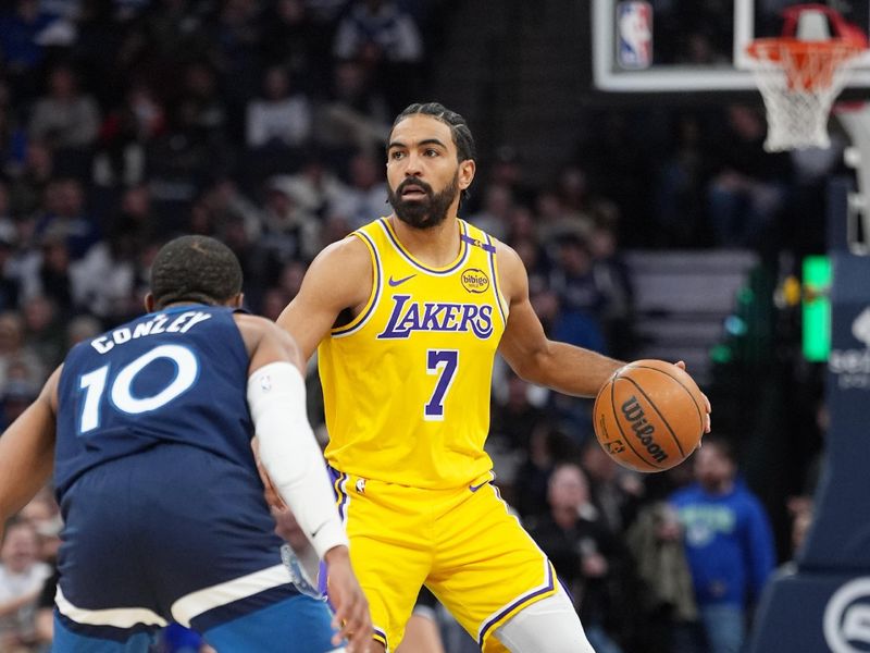 MINNEAPOLIS, MN -  DECEMBER 13: Gabe Vincent #7 of the Los Angeles Lakers looks to pass the ball during the game against the Minnesota Timberwolves on December 13, 2024 at Target Center in Minneapolis, Minnesota. NOTE TO USER: User expressly acknowledges and agrees that, by downloading and or using this Photograph, user is consenting to the terms and conditions of the Getty Images License Agreement. Mandatory Copyright Notice: Copyright 2024 NBAE (Photo by Jordan Johnson/NBAE via Getty Images)