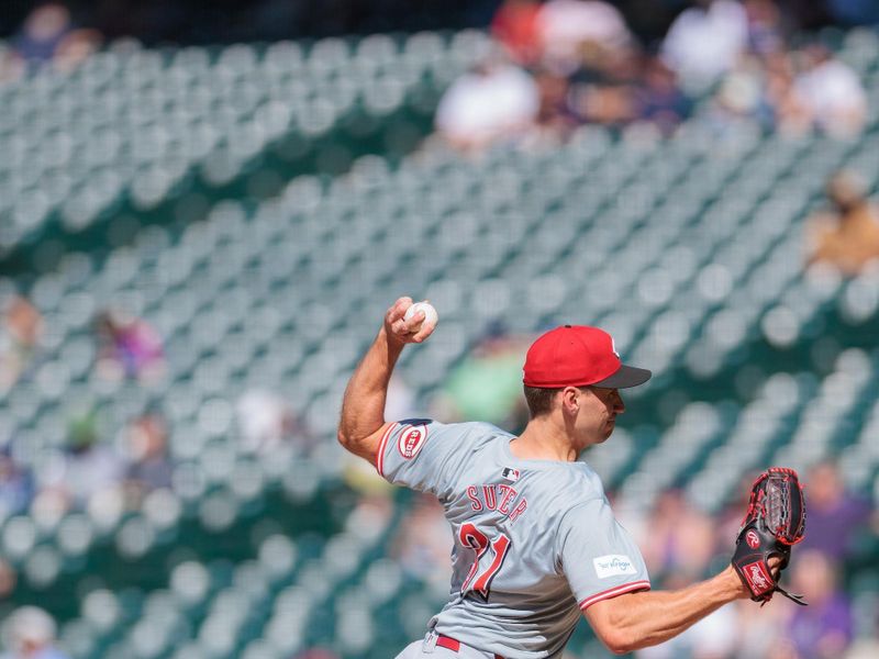 Jun 5, 2024; Denver, Colorado, USA; Cincinnati Reds relief pitcher Brent Suter (31) delivers a pitch during the ninth inning against the Colorado Rockies at Coors Field. Mandatory Credit: Andrew Wevers-USA TODAY Sports