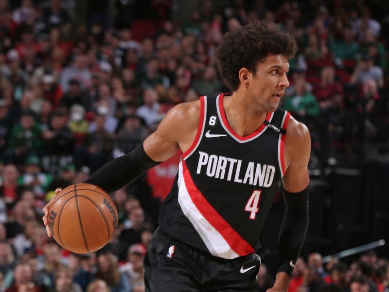 PORTLAND, OR - MARCH 17: Matisse Thybulle #4 of the Portland Trail Blazers dribbles the ball during the game against the Boston Celtics on March 17, 2023 at the Moda Center Arena in Portland, Oregon. NOTE TO USER: User expressly acknowledges and agrees that, by downloading and or using this photograph, user is consenting to the terms and conditions of the Getty Images License Agreement. Mandatory Copyright Notice: Copyright 2023 NBAE (Photo by Cameron Browne/NBAE via Getty Images)