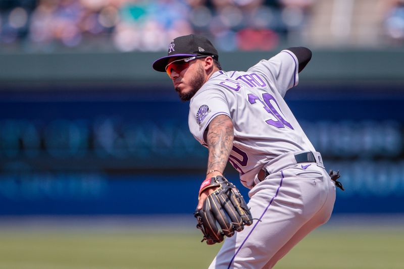 Jun 4, 2023; Kansas City, Missouri, USA; Colorado Rockies second baseman Harold Castro (30) throws to first base during the third inning against the Kansas City Royals at Kauffman Stadium. Mandatory Credit: William Purnell-USA TODAY Sports