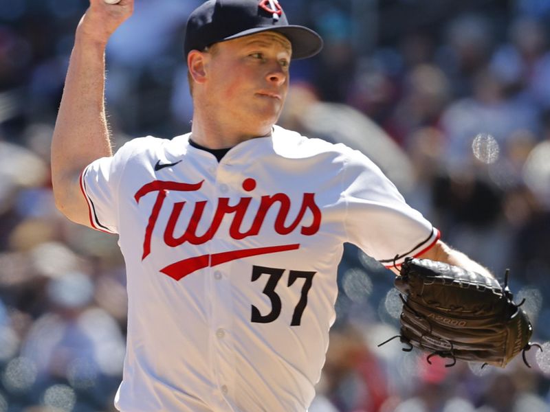 Apr 21, 2024; Minneapolis, Minnesota, USA; Minnesota Twins starting pitcher  Louie Varland (37) throws to the Detroit Tigers in the first inning at Target Field. Mandatory Credit: Bruce Kluckhohn-USA TODAY Sports