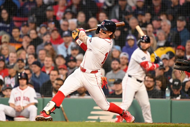 May 16, 2024; Boston, Massachusetts, USA;  Boston Red Sox center fielder Jarren Duran (16) hits a double against the Tampa Bay Rays  during the third inning at Fenway Park. Mandatory Credit: Eric Canha-USA TODAY Sports