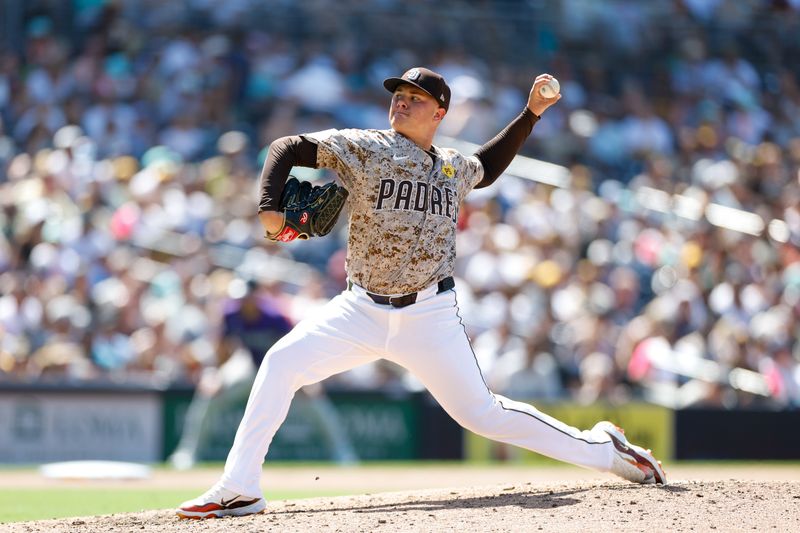 Aug 4, 2024; San Diego, California, USA; San Diego Padres relief pitcher Adrian Morejon (50) throws a pitch during the seventh inning against the Colorado Rockies at Petco Park. Mandatory Credit: David Frerker-USA TODAY Sports