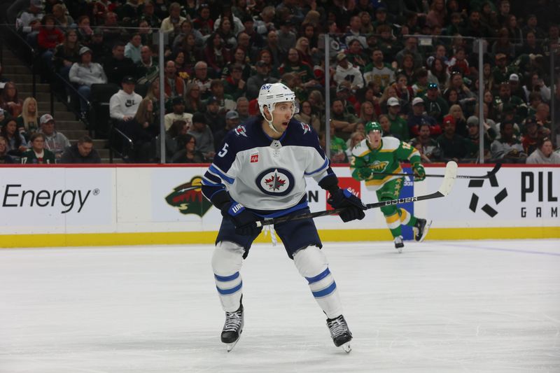 Apr 6, 2024; Saint Paul, Minnesota, USA; Winnipeg Jets defenseman Brenden Dillon (5) reacts during the second period against the Minnesota Wild at Xcel Energy Center. Mandatory Credit: Bruce Fedyck-USA TODAY Sports