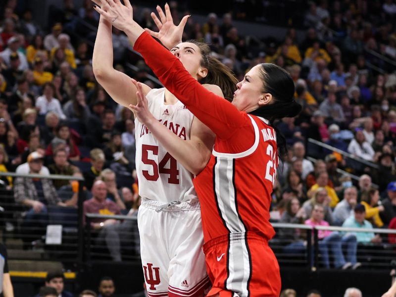 Mar 4, 2023; Minneapolis, MINN, USA; Indiana Hoosiers forward Mackenzie Holmes (54) shoots while Ohio State Buckeyes forward Rebeka Mikulasikova (23) defends during the second half at Target Center. Mandatory Credit: Matt Krohn-USA TODAY Sports