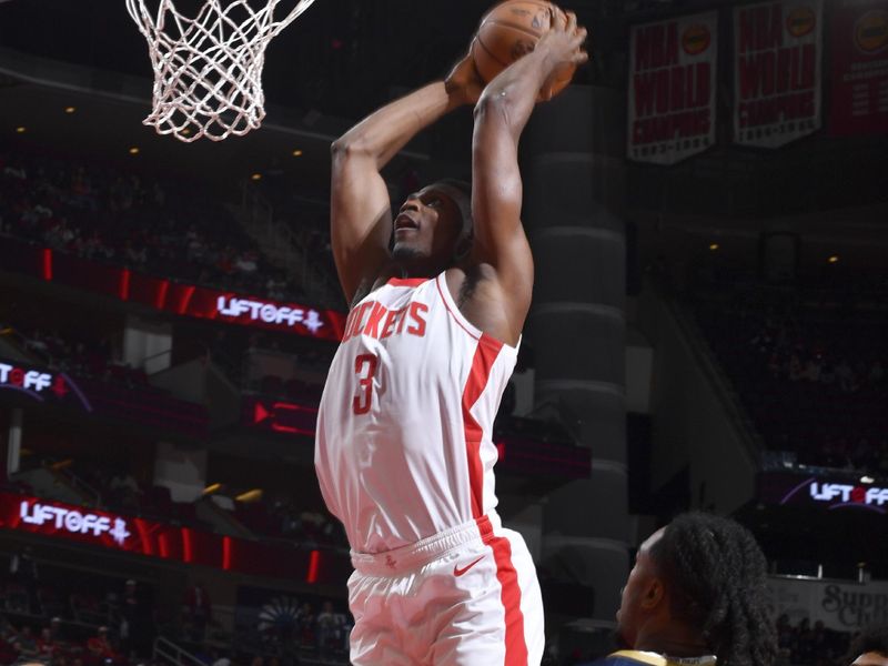 HOUSTON, TX - OCTOBER 15: N'Faly Dante #3 of the Houston Rockets dunks the ball during the game against the New Orleans Pelicans during a NBA preseason game on October 15, 2024 at the Toyota Center in Houston, Texas. NOTE TO USER: User expressly acknowledges and agrees that, by downloading and or using this photograph, User is consenting to the terms and conditions of the Getty Images License Agreement. Mandatory Copyright Notice: Copyright 2024 NBAE (Photo by Logan Riely/NBAE via Getty Images)