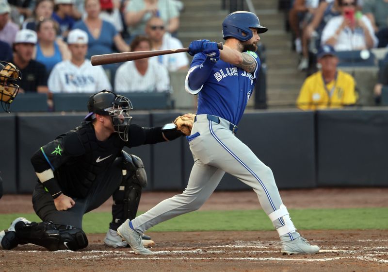 May 23, 2025; St. Petersburg, Florida, USA;  Toronto Blue Jays outfielder Nathan Lukes (38) singles against the Tampa Bay Rays during the third inning at George M. Steinbrenner Field. Mandatory Credit: Kim Klement Neitzel-Imagn Images