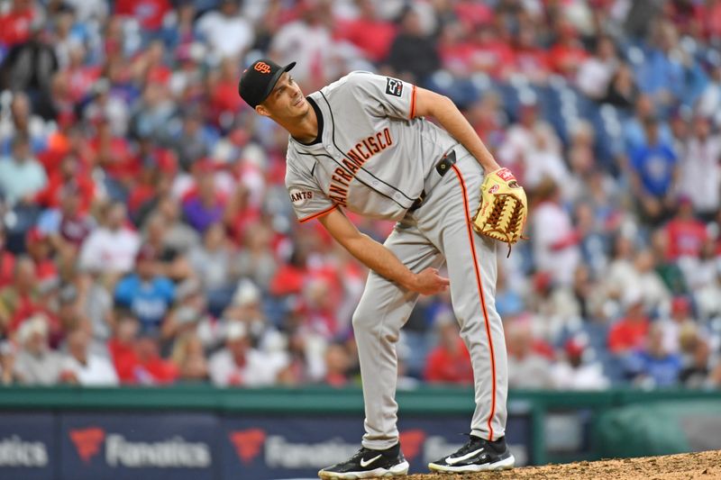 May 6, 2024; Philadelphia, Pennsylvania, USA; San Francisco Giants pitcher Tyler Rogers (71) reacts as he watches home run hit by Philadelphia Phillies designated hitter Kyle Schwarber (12) (not pictured) during the eighth inning at Citizens Bank Park. Mandatory Credit: Eric Hartline-USA TODAY Sports