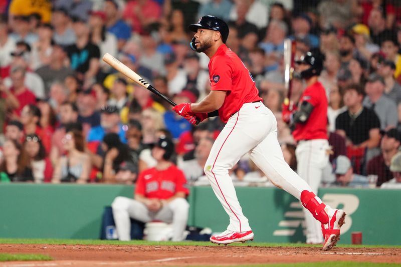 May 24, 2024; Boston, Massachusetts, USA; Boston Red Sox first baseman Dominic Smith (2) watches his home run against the Milwaukee Brewers during the sixth inning at Fenway Park. Mandatory Credit: Gregory Fisher-USA TODAY Sports