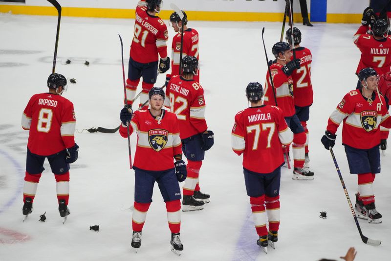 Apr 29, 2024; Sunrise, Florida, USA; Florida Panthers celebrate advancing to the second round of the 2024 Stanley Cup Playoffs with fans following a victory over the Tampa Bay Lightning at Amerant Bank Arena. Mandatory Credit: Jim Rassol-USA TODAY Sports