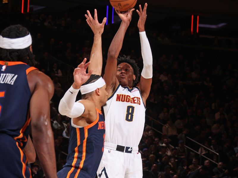 NEW YORK, NY - JANUARY 25: Peyton Watson #8 of the Denver Nuggets three point basket during the game against the New York Knicks on January 25, 2024 at Madison Square Garden in New York City, New York.  NOTE TO USER: User expressly acknowledges and agrees that, by downloading and or using this photograph, User is consenting to the terms and conditions of the Getty Images License Agreement. Mandatory Copyright Notice: Copyright 2024 NBAE  (Photo by Nathaniel S. Butler/NBAE via Getty Images)