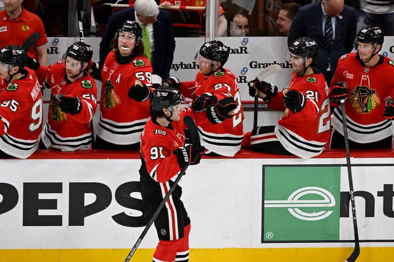 Mar 17, 2026; Chicago, Illinois, USA;  Chicago Blackhawks center Frank Nazar (91) celebrates with teammates after he scored a goal against the Minnesota Wild during the third period at United Center. Mandatory Credit: Matt Marton-Imagn Images