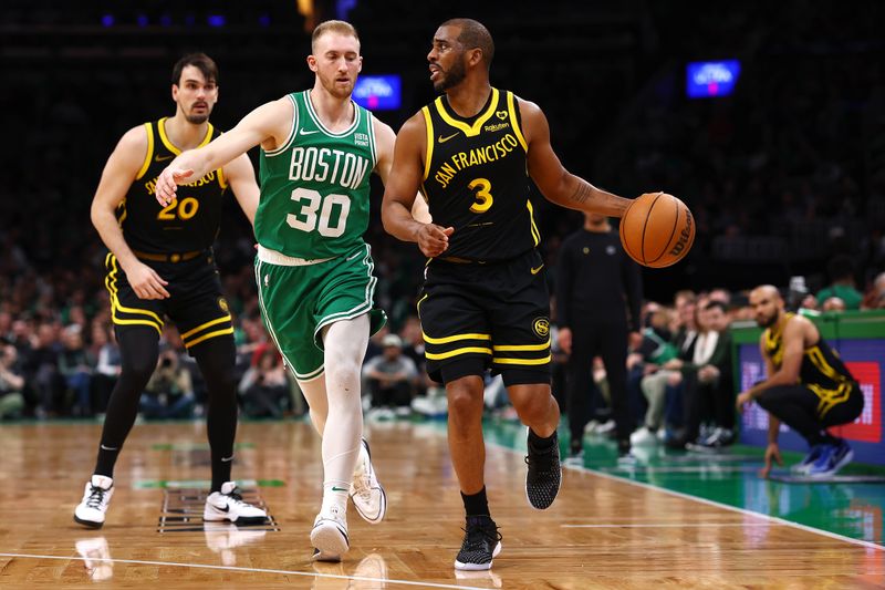 BOSTON, MASSACHUSETTS - MARCH 03: Chris Paul #3 of the Golden State Warriors dribbles downcourt against Sam Hauser #30 of the Boston Celtics during the second half at TD Garden on March 03, 2024 in Boston, Massachusetts. The Celtics defeat the Warriors 140-88. NOTE TO USER: User expressly acknowledges and agrees that, by downloading and or using this photograph, user is consenting to the terms and conditions of the Getty Images License Agreement.  (Photo by Maddie Meyer/Getty Images)