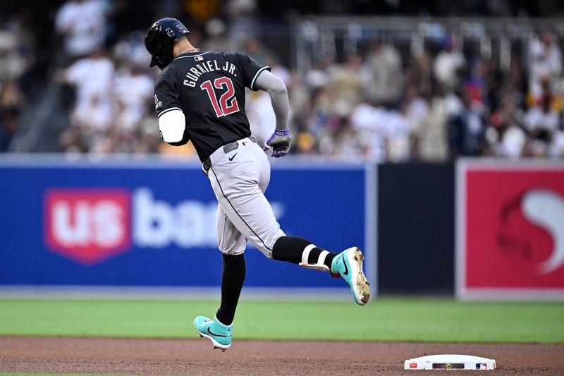 Jul 6, 2024; San Diego, California, USA; Arizona Diamondbacks left fielder Lourdes Gurriel Jr. (12) rounds the bases after hitting a home run against the San Diego Padres during the fourth inning at Petco Park. Mandatory Credit: Orlando Ramirez-USA TODAY Sports