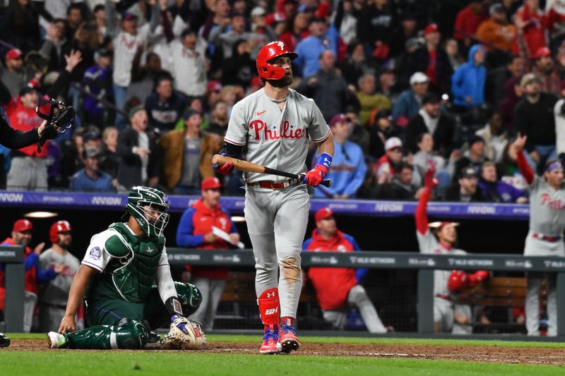 May 13, 2023; Denver, Colorado, USA; Philadelphia Phillies designated hitter Bryce Harper (3) watches the flight of the ball for a home run in the ninth inning against the Colorado Rockies at Coors Field. Mandatory Credit: John Leyba-USA TODAY Sports