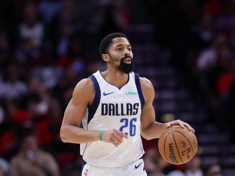 HOUSTON, TEXAS - JANUARY 01: Spencer Dinwiddie #26 of the Dallas Mavericks handles the ball against the Houston Rockets during the first half at Toyota Center on January 01, 2025 in Houston, Texas. NOTE TO USER: User expressly acknowledges and agrees that, by downloading and or using this photograph, User is consenting to the terms and conditions of the Getty Images License Agreement. (Photo by Alex Slitz/Getty Images)