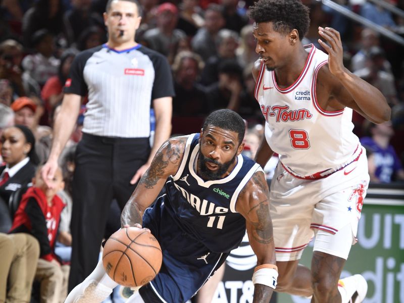 HOUSTON, TX - MARCH 31: Kyrie Irving #11 of the Dallas Mavericks handles the ball during the game against the Houston Rockets on March 31, 2024 at the Toyota Center in Houston, Texas. NOTE TO USER: User expressly acknowledges and agrees that, by downloading and or using this photograph, User is consenting to the terms and conditions of the Getty Images License Agreement. Mandatory Copyright Notice: Copyright 2024 NBAE (Photo by Logan Riely/NBAE via Getty Images)