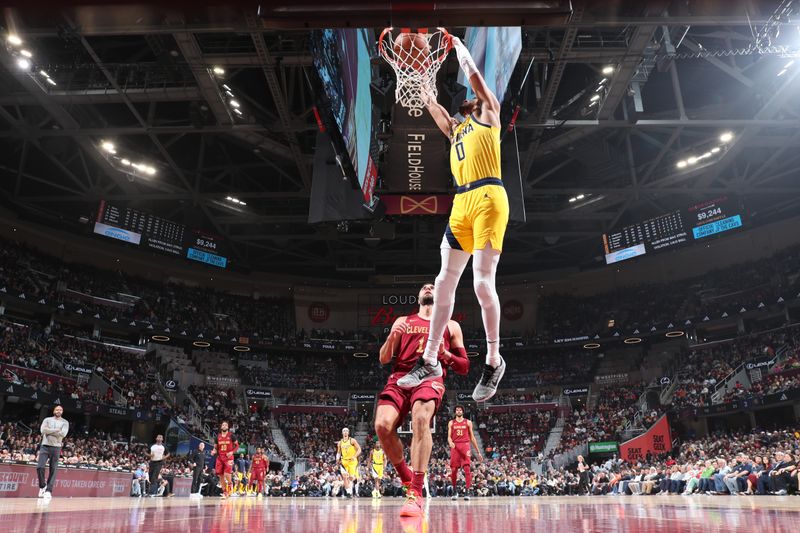 CLEVELAND, OH - APRIL 12: Tyrese Haliburton #0 of the Indiana Pacers dunks the ball during the game against the Cleveland Cavaliers on April 12, 2024 at Rocket Mortgage FieldHouse in Cleveland, Ohio. NOTE TO USER: User expressly acknowledges and agrees that, by downloading and/or using this Photograph, user is consenting to the terms and conditions of the Getty Images License Agreement. Mandatory Copyright Notice: Copyright 2024 NBAE (Photo by Jeff Haynes/NBAE via Getty Images)