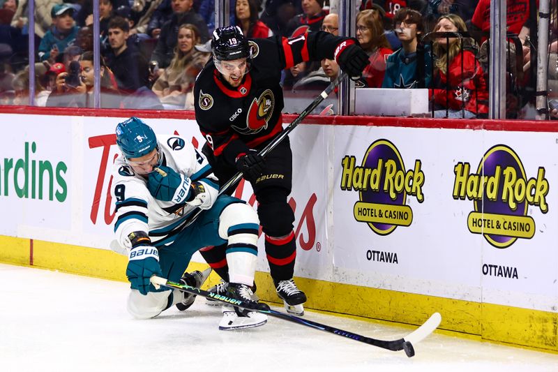 Mar 15, 2026; Ottawa, Ontario, CAN; Ottawa Senators right wing Drake Batherson (19) goes for the puck with San Jose Sharks defenseman Dmitry Orlov (9) during the first period at Canadian Tire Centre. Mandatory Credit: Keito Newman-Imagn Images
