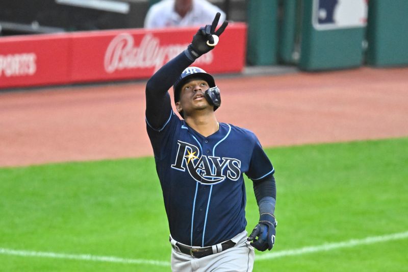 Sep 2, 2023; Cleveland, Ohio, USA; Tampa Bay Rays catcher Christian Bethancourt (14) celebrates after hitting a three-run home run against the Cleveland Guardians in the fifth inning at Progressive Field. Mandatory Credit: David Richard-USA TODAY Sports