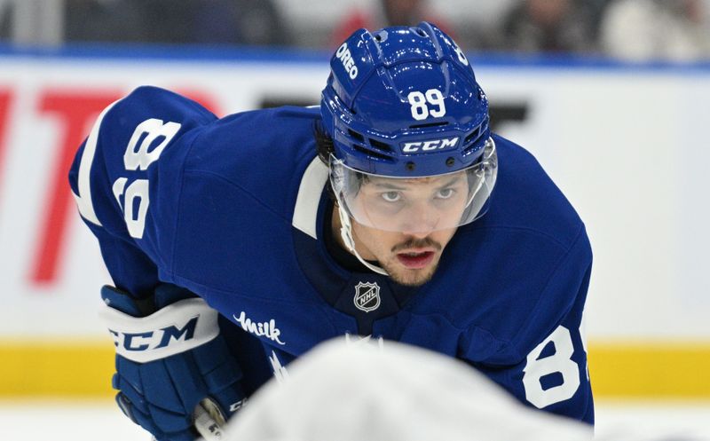 Sep 26, 2024; Toronto, Ontario, CAN;  Toronto Maple Leafs forward Nick Robertson (89) prepares for a faceoff against the Montreal Canadiens in the third period at Scotiabank Arena. Mandatory Credit: Dan Hamilton-Imagn Images