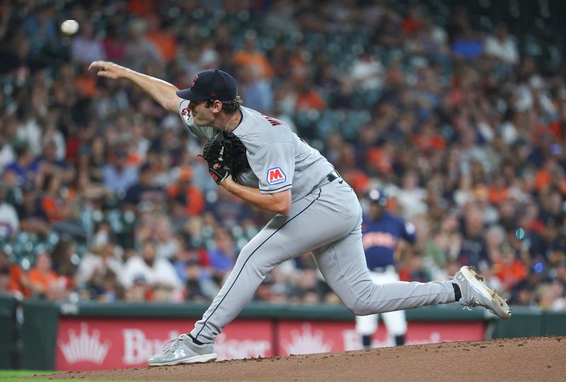 Aug 1, 2023; Houston, Texas, USA; Cleveland Guardians starting pitcher Gavin Williams (63) delivers a pitch during the first inning against the Houston Astros at Minute Maid Park. Mandatory Credit: Troy Taormina-USA TODAY Sports