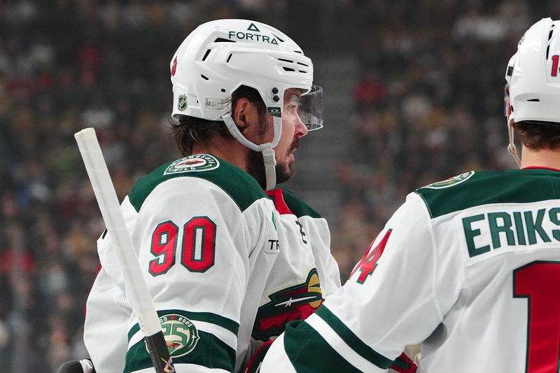 Dec 29, 2025; Las Vegas, Nevada, USA; Minnesota Wild left wing Marcus Johansson (90) celebrates after scoring a goal against the Vegas Golden Knights during the first period at T-Mobile Arena. Mandatory Credit: Stephen R. Sylvanie-Imagn Images