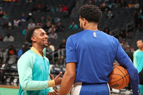CHARLOTTE, NC - DECEMBER 16: Ish Smith #14 of the Charlotte Hornets talks to Tobias Harris #12 of the Philadelphia 76ers before the game on December 16, 2023 at Spectrum Center in Charlotte, North Carolina. NOTE TO USER: User expressly acknowledges and agrees that, by downloading and or using this photograph, User is consenting to the terms and conditions of the Getty Images License Agreement. Mandatory Copyright Notice: Copyright 2023 NBAE (Photo by Kent Smith/NBAE via Getty Images)