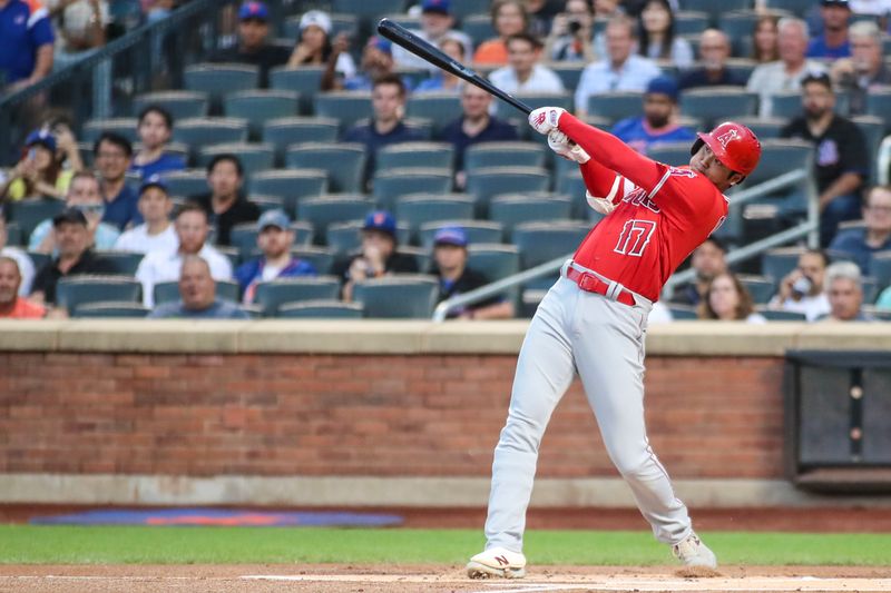 Aug 26, 2023; New York City, New York, USA;  Los Angeles Angels designated hitter Shohei Ohtani (17) hits a double in the first inning against the New York Mets at Citi Field. Mandatory Credit: Wendell Cruz-USA TODAY Sports