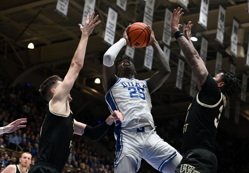 Feb 12, 2024; Durham, North Carolina, USA;  Duke Blue Devils forward Mark Mitchell (25) shoots over Wake Forest Deamon Deacons guard Damari Monsanto (30) during the second half at Cameron Indoor Stadium. The Blue Devils won 77-69. Mandatory Credit: Rob Kinnan-USA TODAY Sports