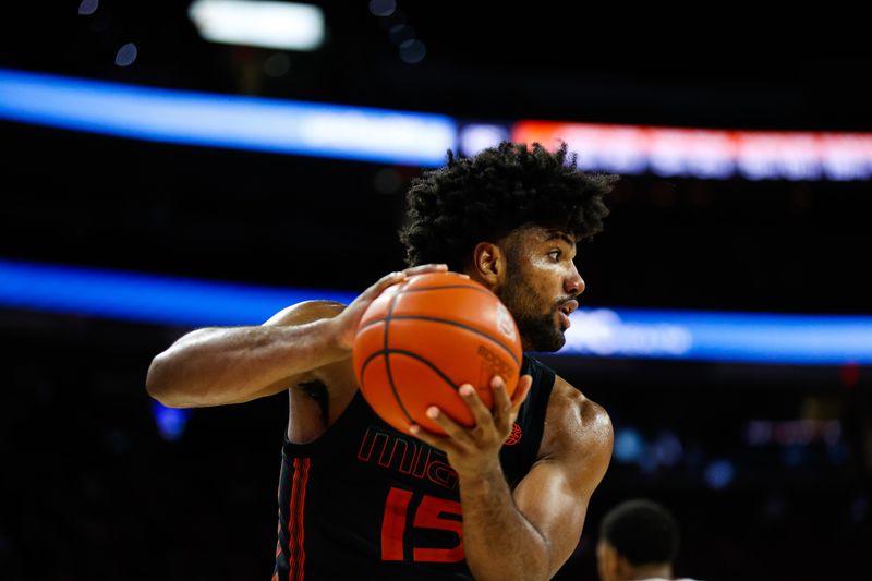 Jan 30, 2024; Raleigh, North Carolina, USA; Miami (Fl) Hurricanes guard Nijel Pack (24) with the ball during the second half against North Carolina State Wolfpack at PNC Arena. Mandatory Credit: Jaylynn Nash-USA TODAY Sports