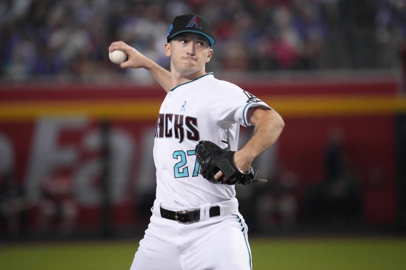 Jun 18, 2023; Phoenix, Arizona, USA; Arizona Diamondbacks starting pitcher Zach Davies (27) pitches against the Cleveland Guardians during the third inning at Chase Field. Mandatory Credit: Joe Camporeale-USA TODAY Sports