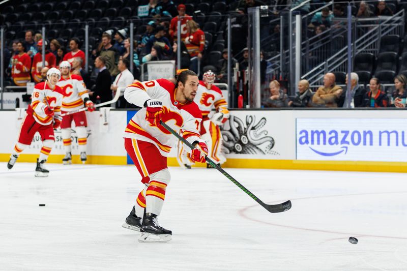 Oct 19, 2024; Seattle, Washington, USA; Calgary Flames left wing Ryan Lomberg (70) warms up before the game against the Seattle Kraken at Climate Pledge Arena. Mandatory Credit: Caean Couto-Imagn Images