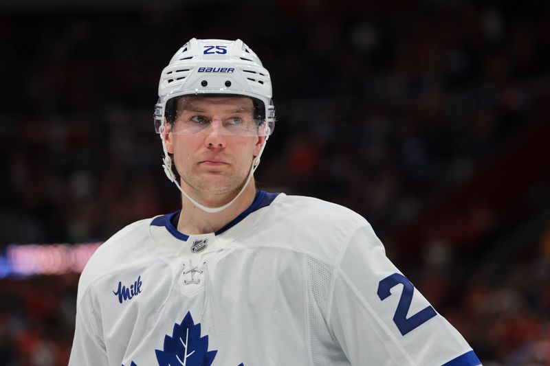 Apr 8, 2025; Sunrise, Florida, USA; Toronto Maple Leafs defenseman Brandon Carlo (25) looks on against the Florida Panthers during the second period at Amerant Bank Arena. Mandatory Credit: Sam Navarro-Imagn Images