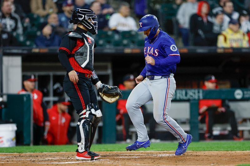 May 23, 2025; Chicago, Illinois, USA; Texas Rangers left fielder Wyatt Langford (36) scores against the Chicago White Sox during the sixth inning at Rate Field. Mandatory Credit: Kamil Krzaczynski-Imagn Images