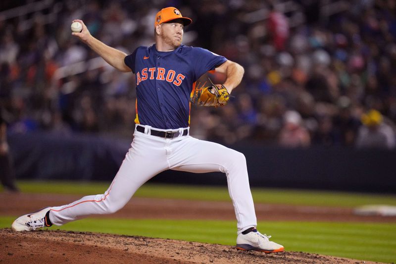 Mar 16, 2024; West Palm Beach, Florida, USA;  Houston Astros relief pitcher Ryan Gusto (98) pitches in the sixth inning against the New York Mets at CACTI Park of the Palm Beaches. Mandatory Credit: Jim Rassol-USA TODAY Sports