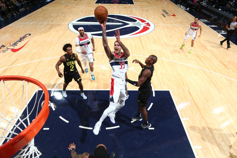 WASHINGTON, DC -? JANUARY 25: Kyle Kuzma #33 of the Washington Wizards shoots the ball during the game against the Utah Jazz on January 25, 2024 at Capital One Arena in Washington, DC. NOTE TO USER: User expressly acknowledges and agrees that, by downloading and or using this Photograph, user is consenting to the terms and conditions of the Getty Images License Agreement. Mandatory Copyright Notice: Copyright 2024 NBAE (Photo by Stephen Gosling/NBAE via Getty Images)